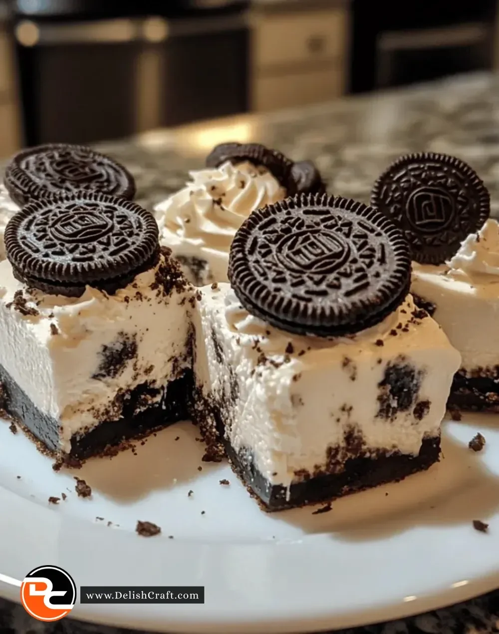 No-bake Oreo Cheesecake Bites on a plate, topped with crushed Oreos