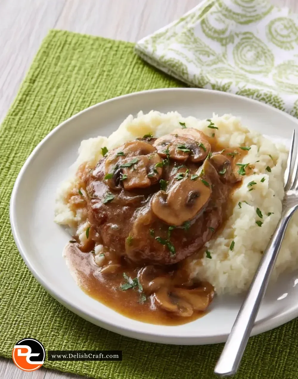 Delicious hamburger steaks smothered in onion and mushroom gravy