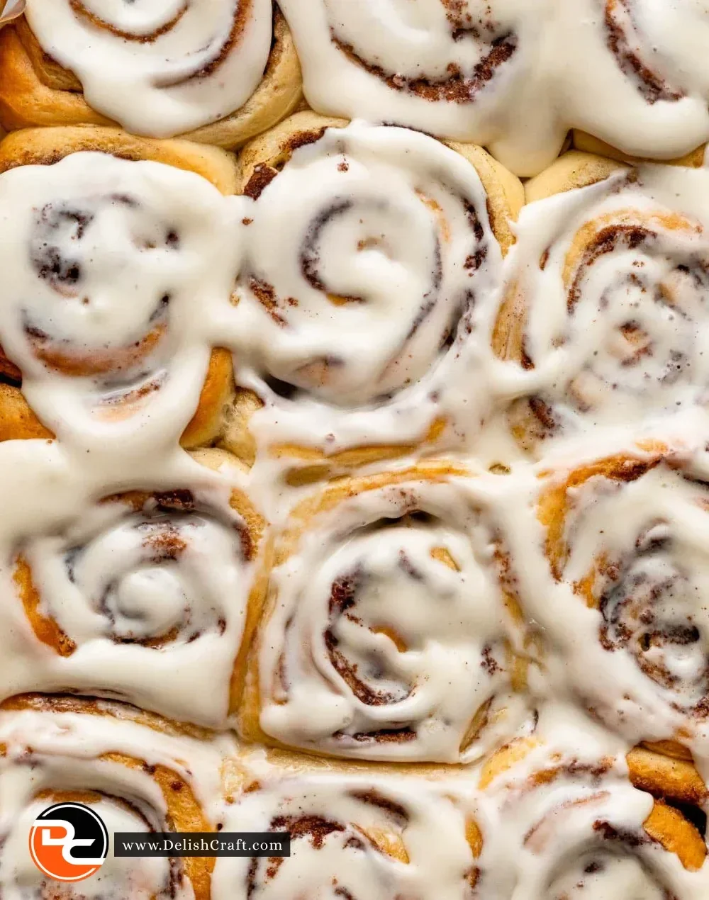 Delicious homemade overnight cinnamon rolls topped with creamy frosting