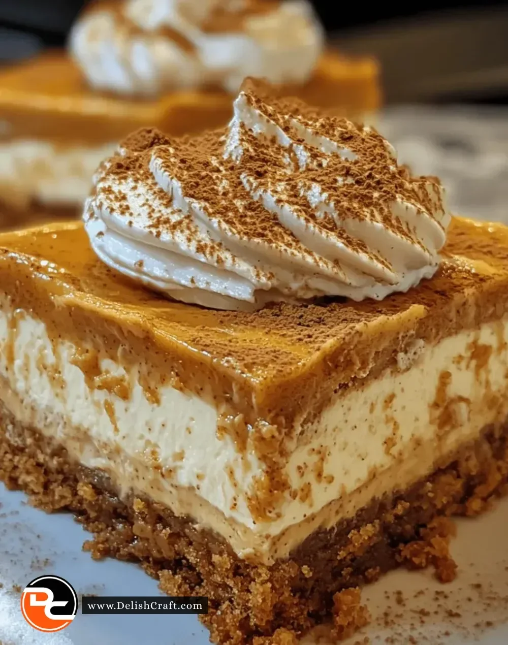 Delicious pumpkin spice cheesecake bars with a creamy texture and fall spices