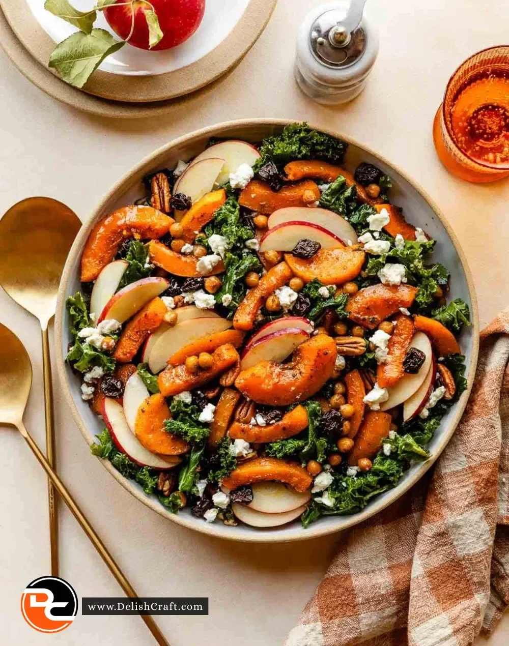Maple-roasted squash salad with kale in a bowl, garnished and ready to serve.