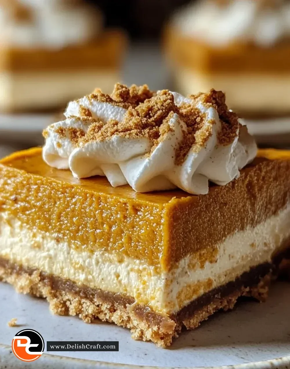 No Bake Pumpkin Cheesecake Bars with a creamy pumpkin filling and graham cracker crust