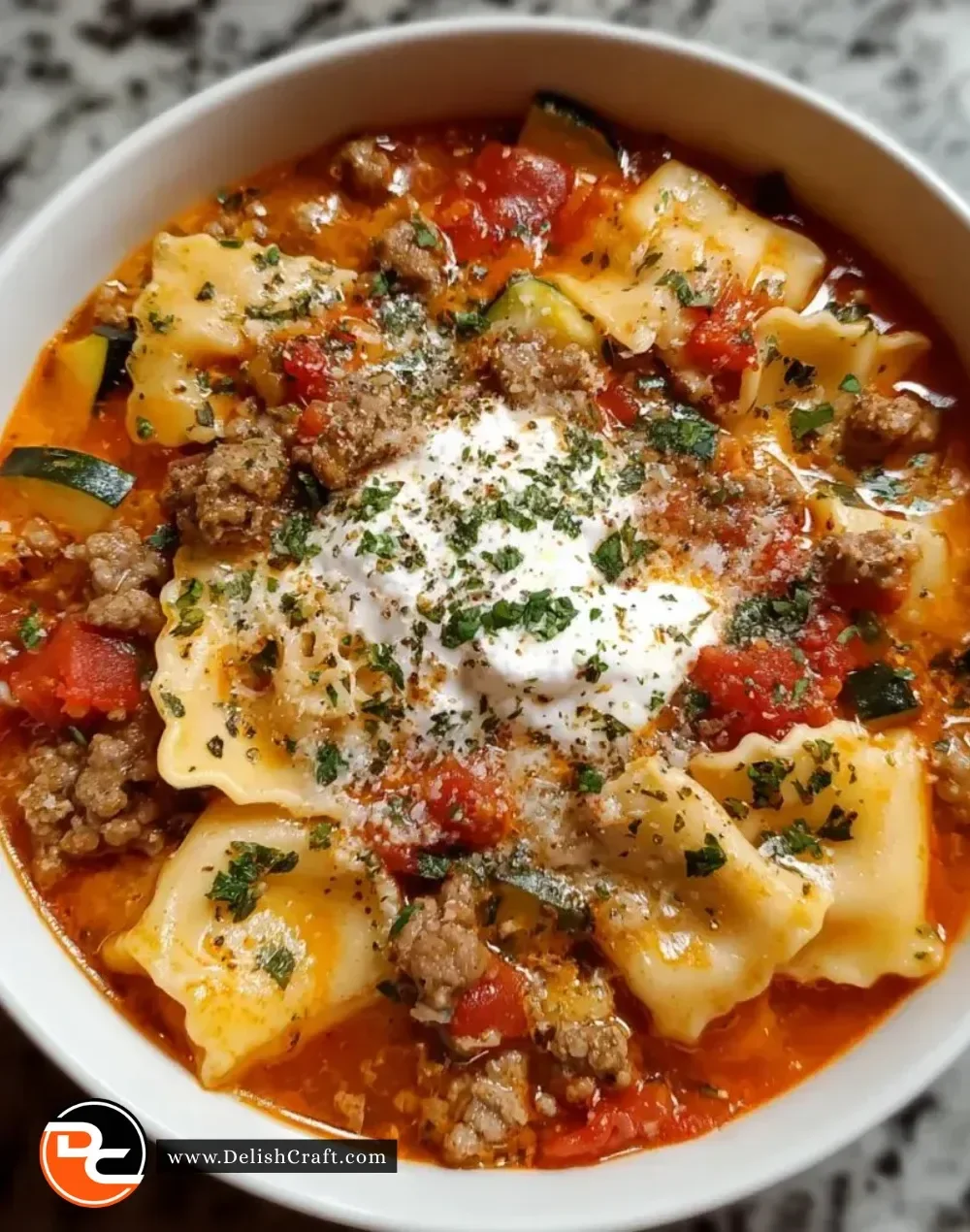Sausage Lasagna Soup with melted cheese and rich tomato broth in a bowl