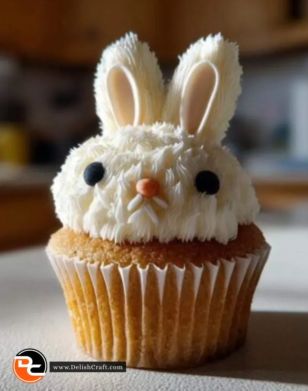 Amazing Carrot Cake Bunny Cupcakes with cute bunny toppers and cream cheese frosting
