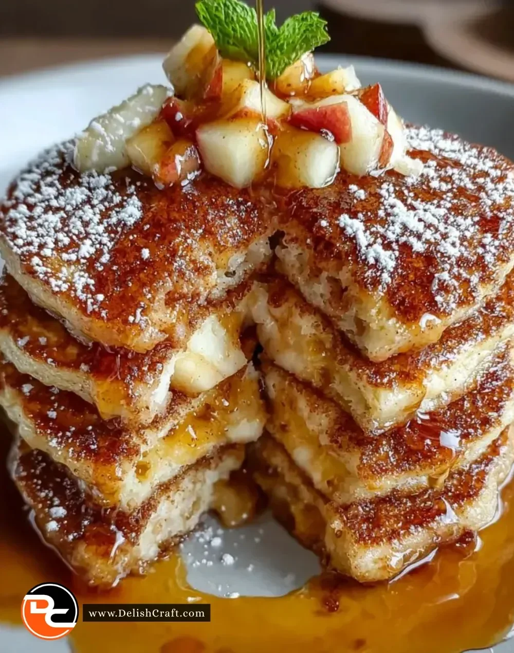 Delicious apple pie pancakes drizzled with vanilla maple syrup.