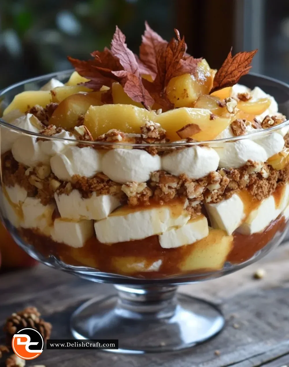 Baked Apple Caramel Speculoos Trifle dessert in a glass dish