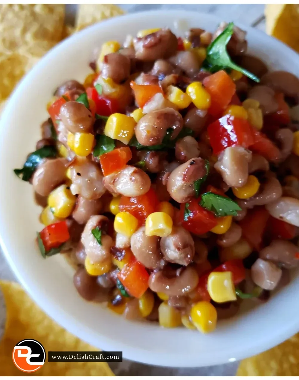 Delicious Black Eyed Pea Dip served in a bowl with fresh herbs