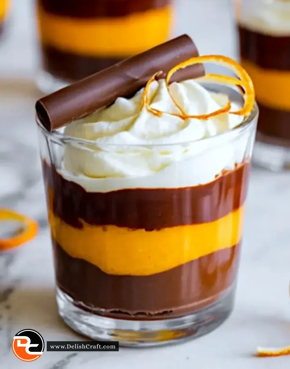 Delicious Chocolate Orange Trifle Cups served in elegant glasses with layers of chocolate and orange.
