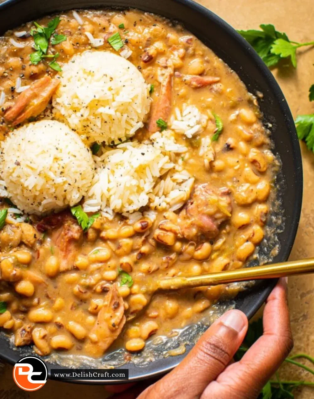 Creamy Southern black eyed peas served in a bowl with herbs and spices