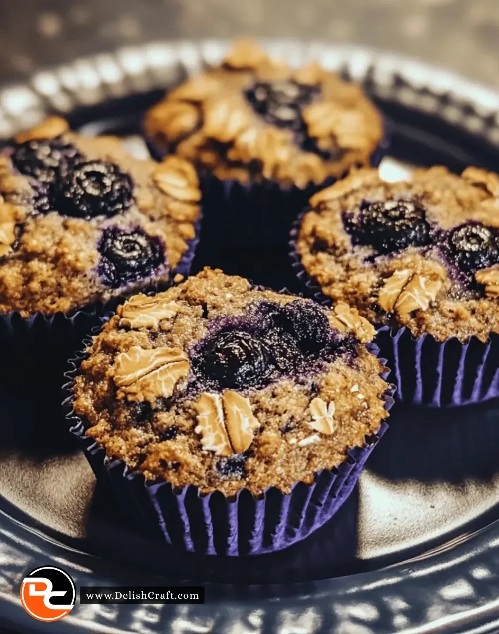 Easy gluten-free blueberry oat muffins on a wooden table.