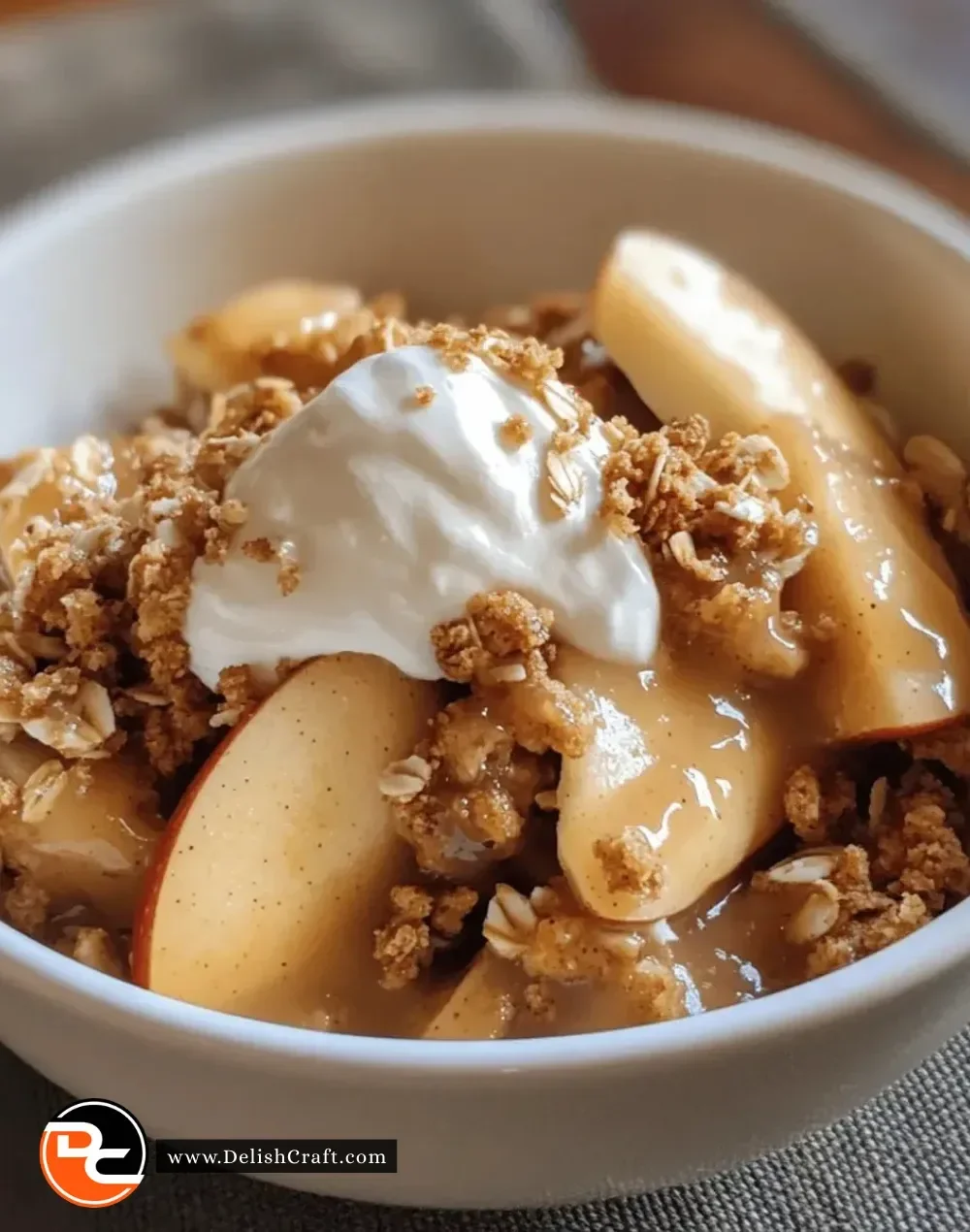 Delicious easy microwave apple crisp bowl topped with oats and cinnamon