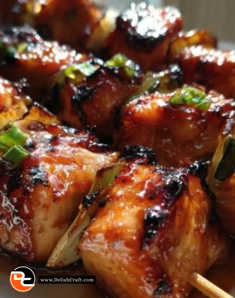 Grilled honey sriracha chicken skewers ready to serve