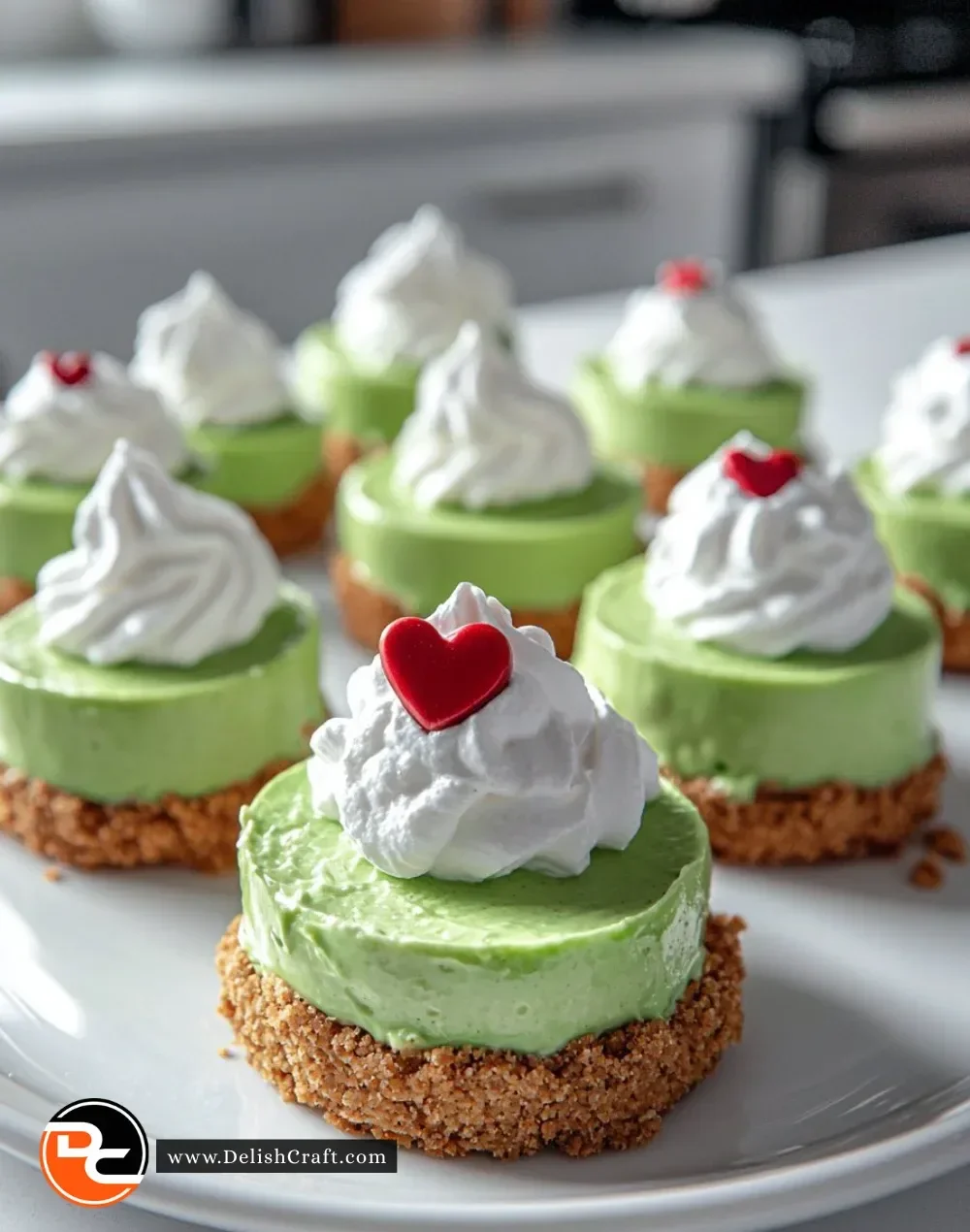 Festive Grinch Mini Cheesecake with red and green toppings for the holidays