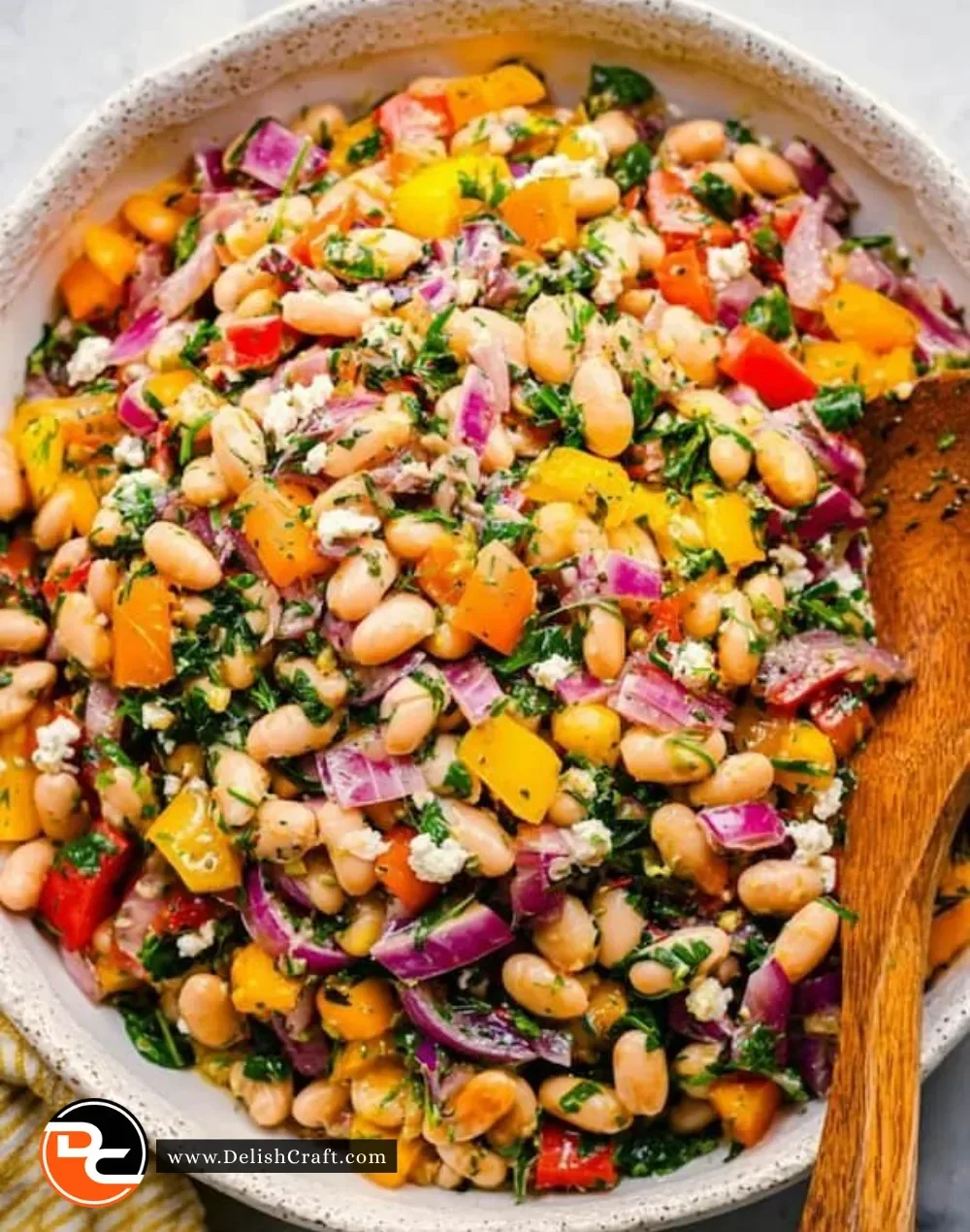 High protein dense bean salad with colorful beans and fresh vegetables