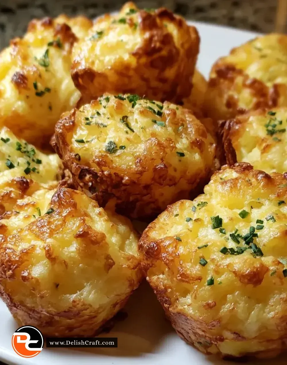 Crispy leftover mashed potato cheese puffs on a white plate