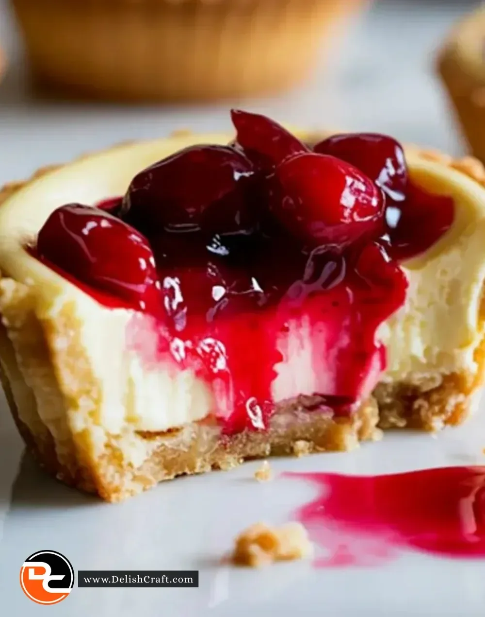 Mini cranberry cheesecake tarts on a dessert platter