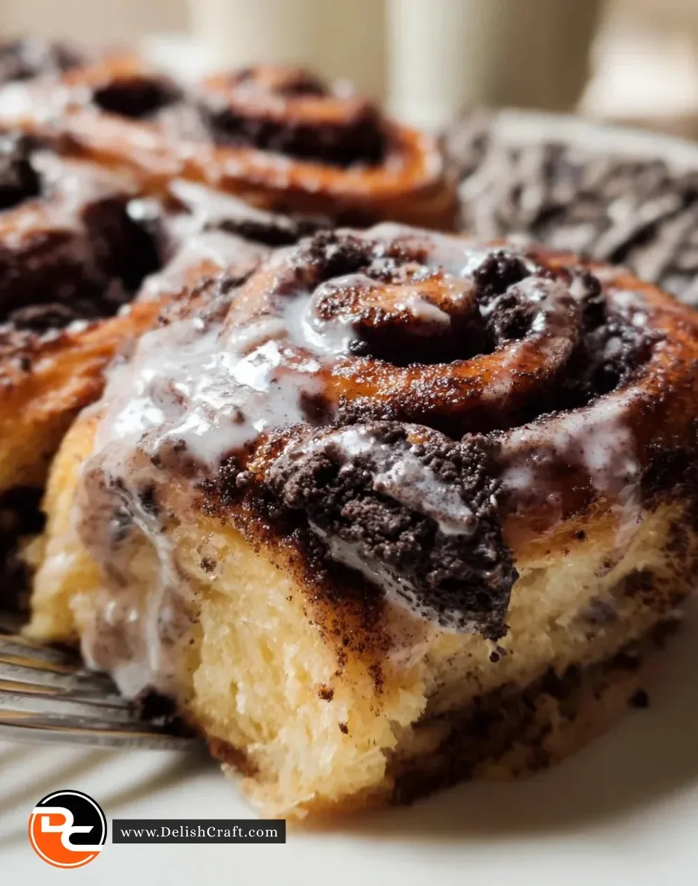 Deliciously baked Oreo Cinnamon Rolls with creamy frosting and Oreo toppings