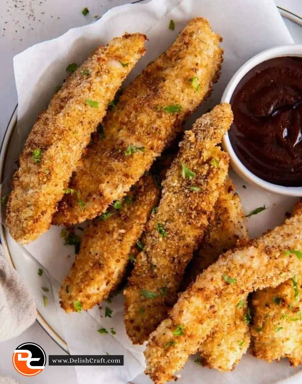 Crispy air fryer chicken tenders served with dipping sauce