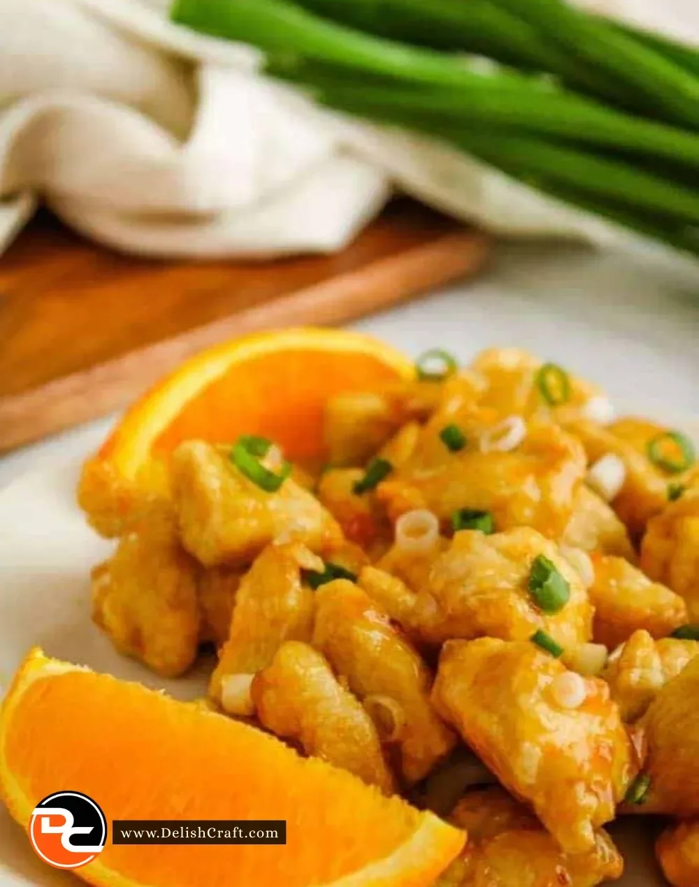 Crispy Air Fryer Orange Chicken served with steaming rice and vegetables