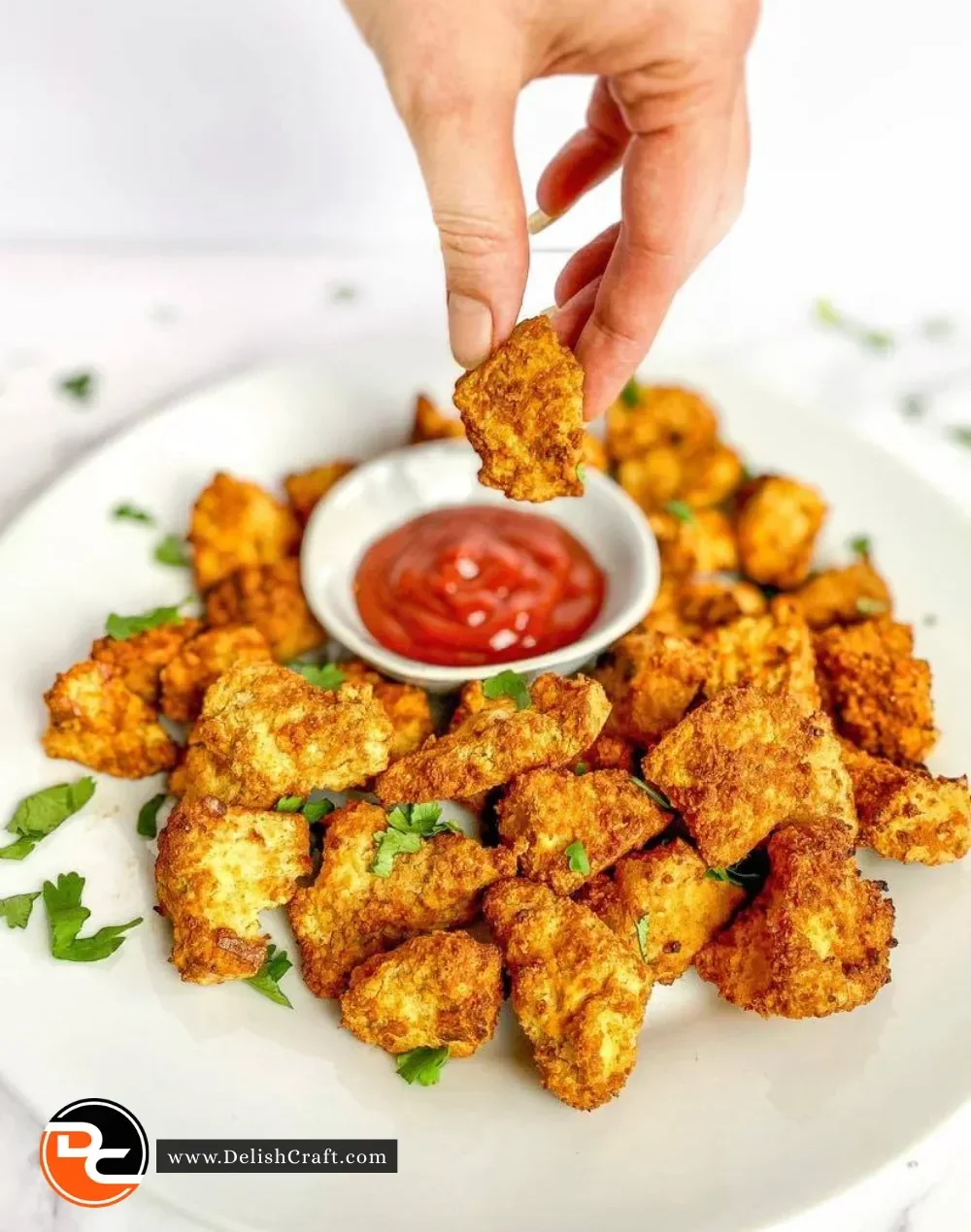 Crispy air fryer tofu nuggets served in a bowl, perfect for a vegan snack.