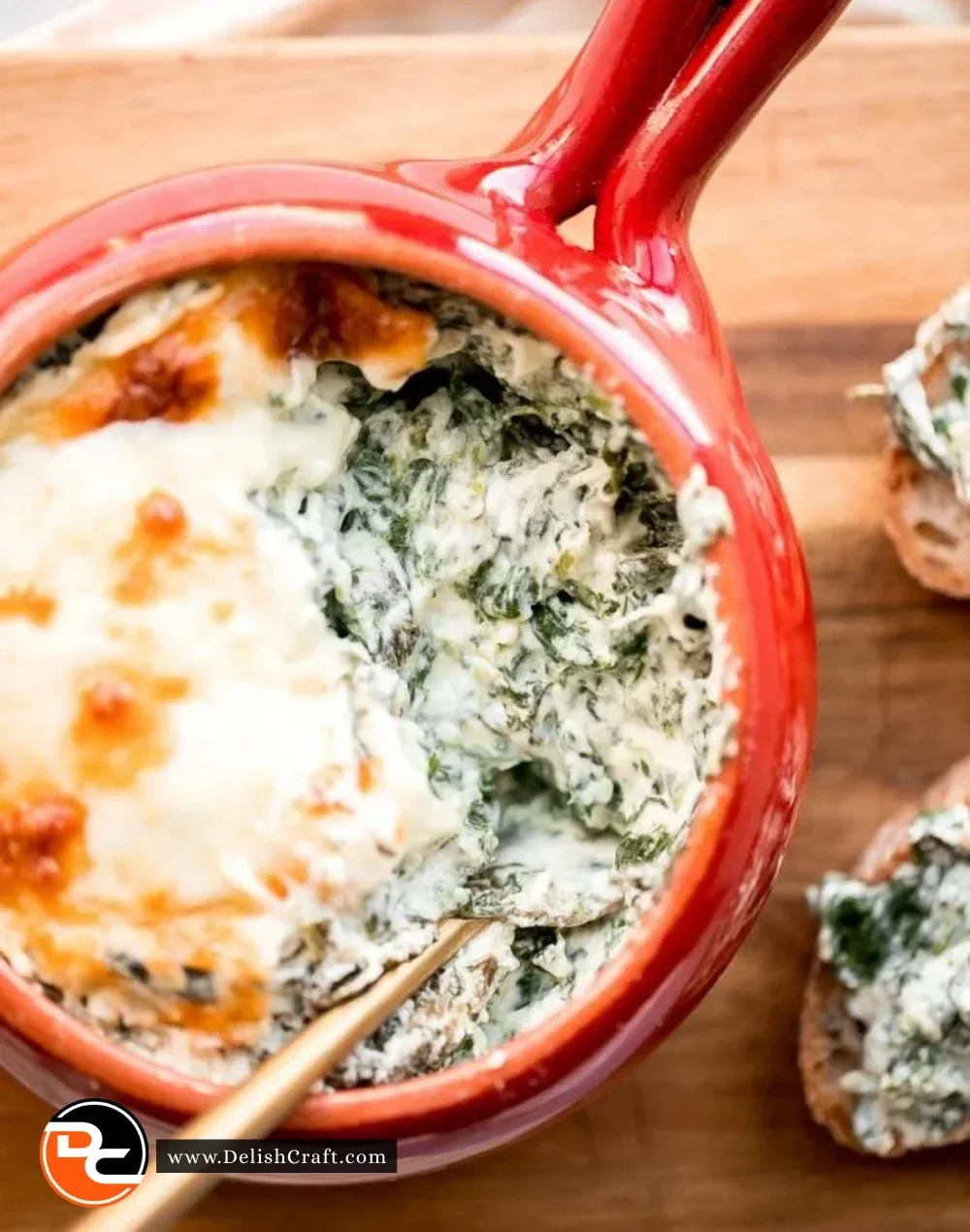 Delicious baked spinach dip served with crispy tortilla chips