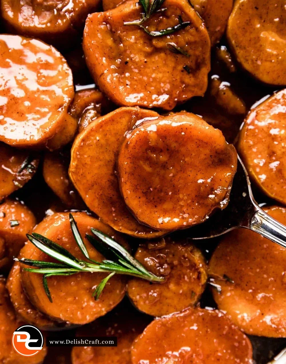 Delicious candied sweet potatoes served in a bowl with a glossy glaze
