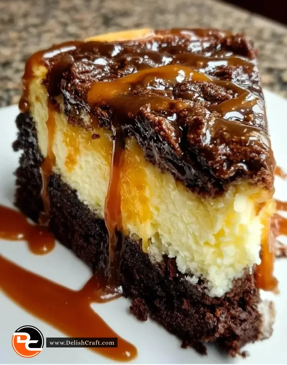 Delicious caramel brownie cheesecake slice on a plate
