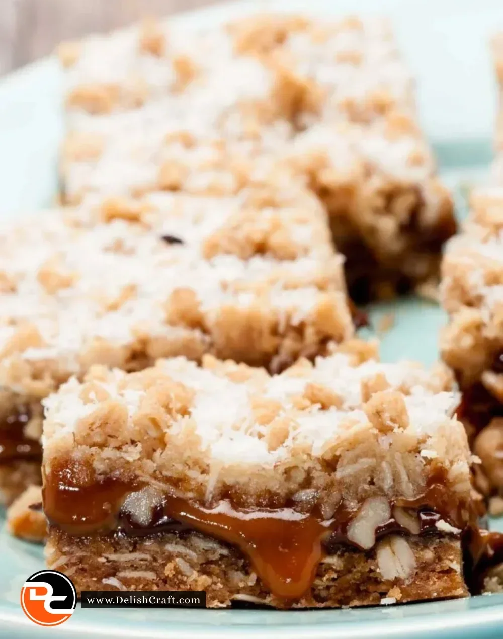 Delicious homemade Carmelita Bars layered with oats and chocolate