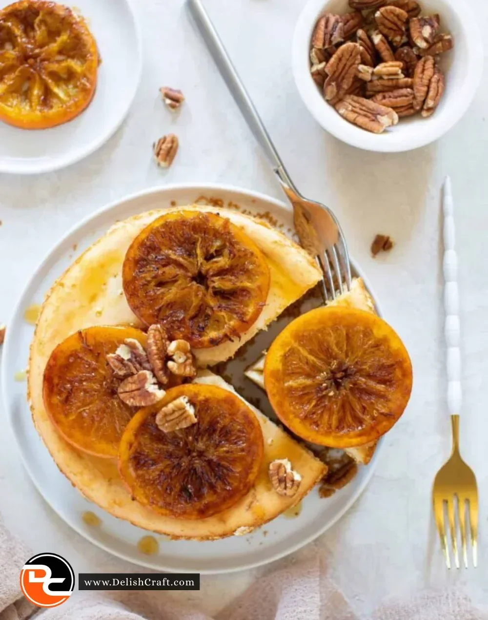 Creamy spiced orange cheesecake topped with zest and spices