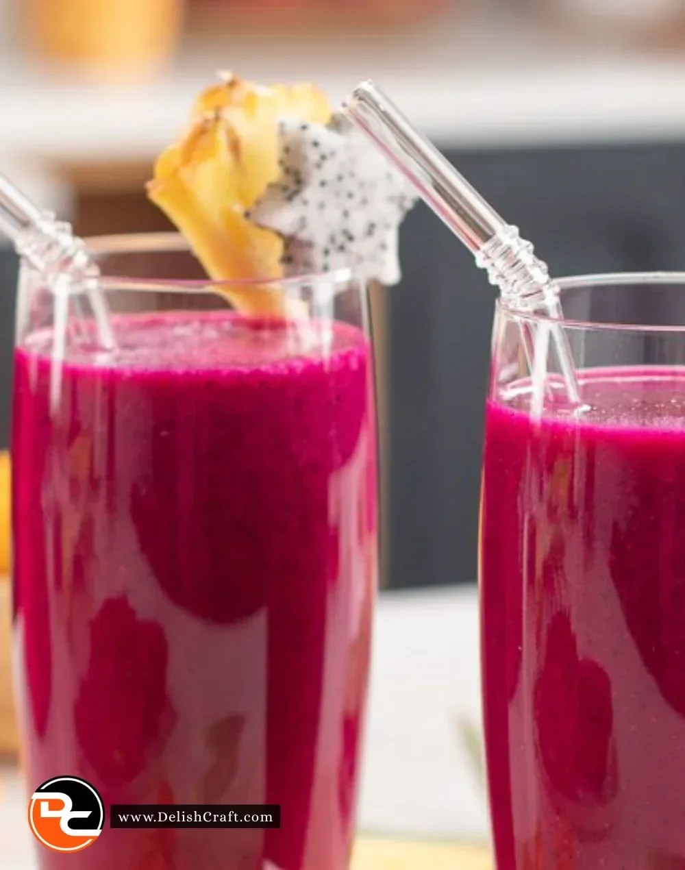 A refreshing Dragonfruit Hibiscus Smoothie in a glass with vibrant colors.