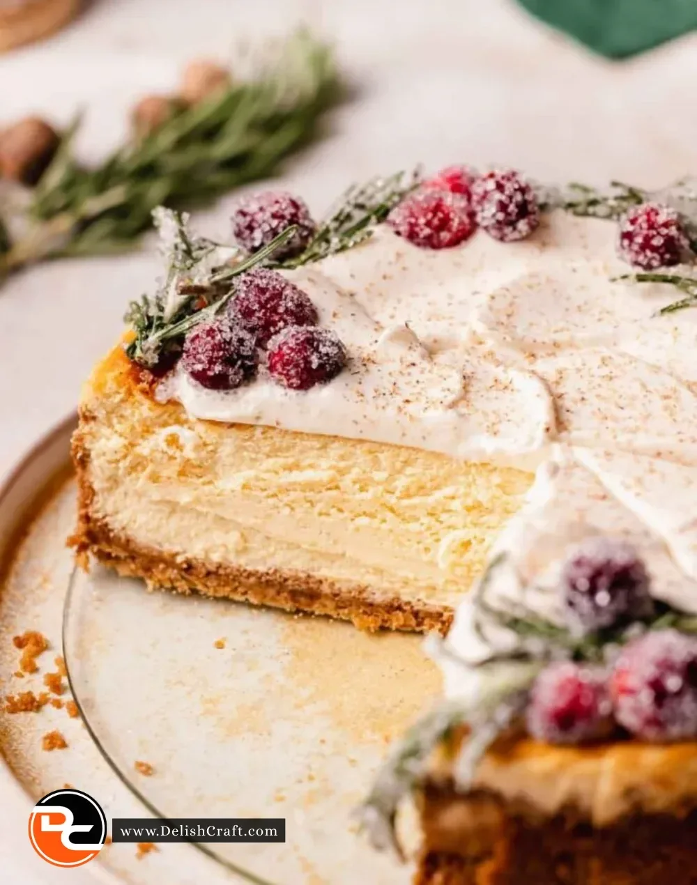 Delicious eggnog cheesecake topped with whipped cream and festive spices