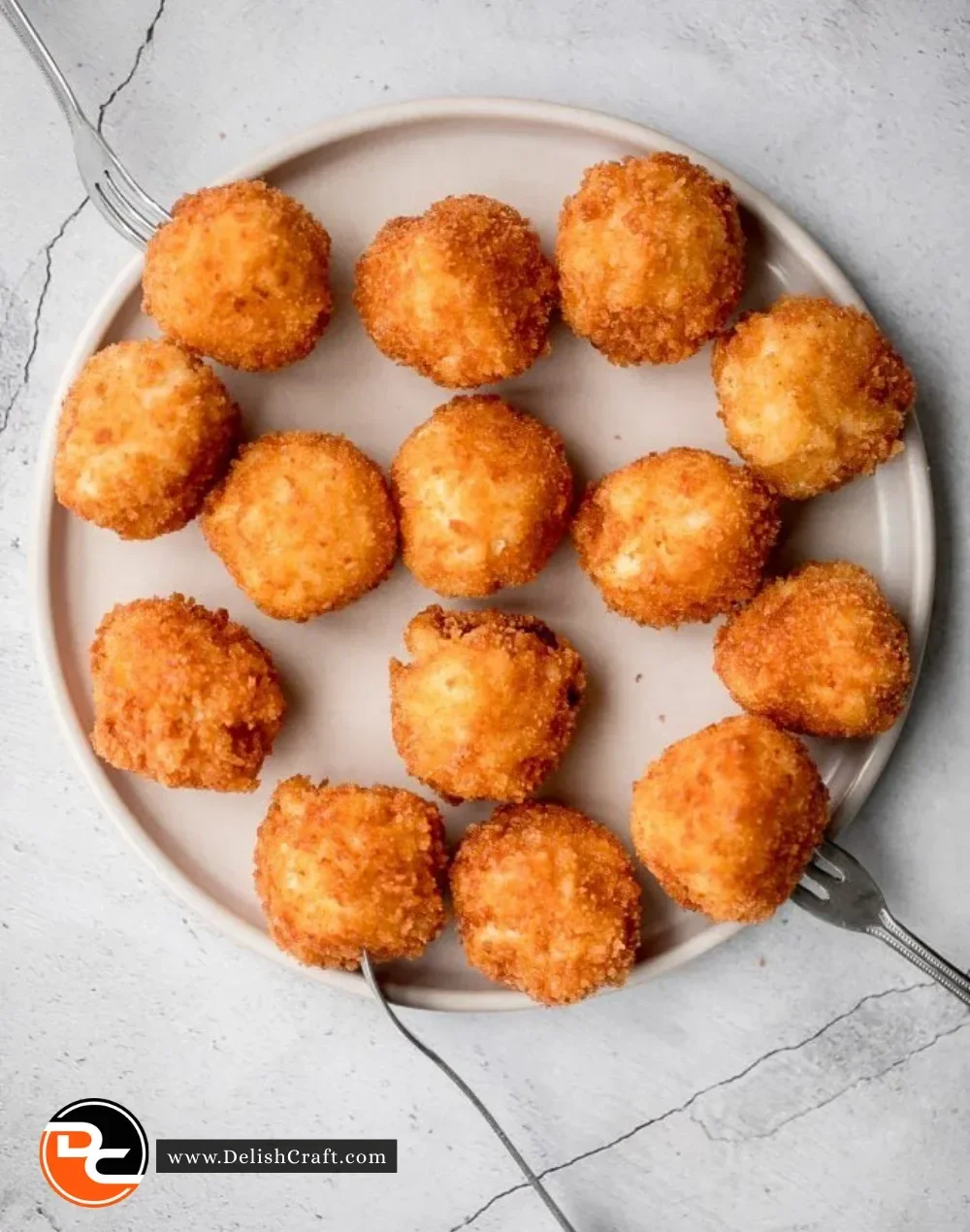 Delicious homemade fried mac and cheese balls served with dipping sauce