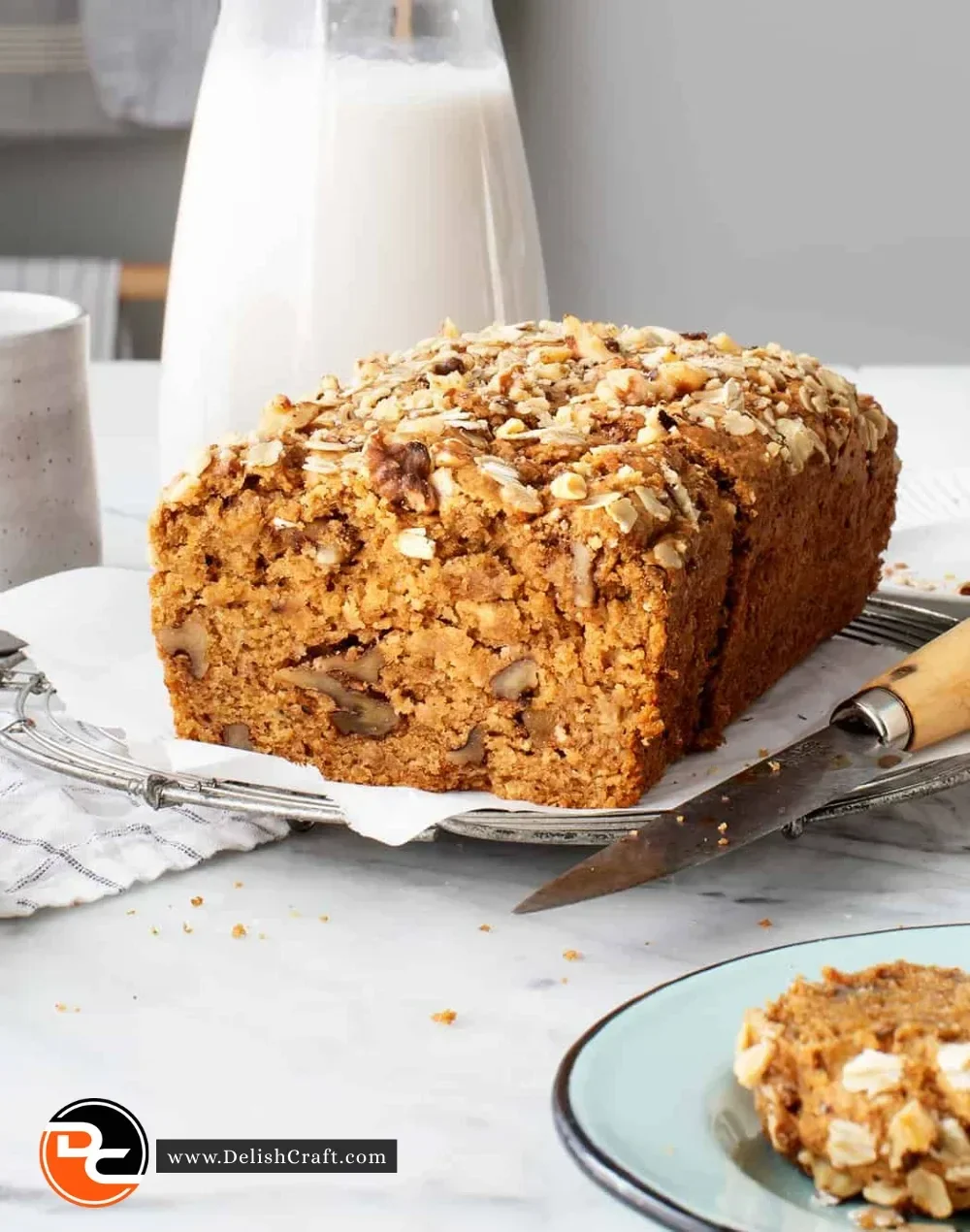Slice of healthy banana bread on a wooden table