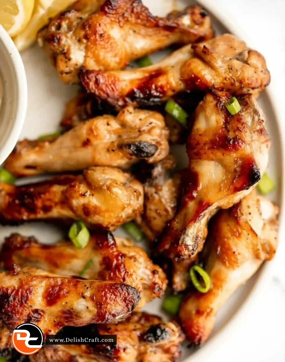 Delicious Honey Mustard Chicken Wings garnished and ready to serve.