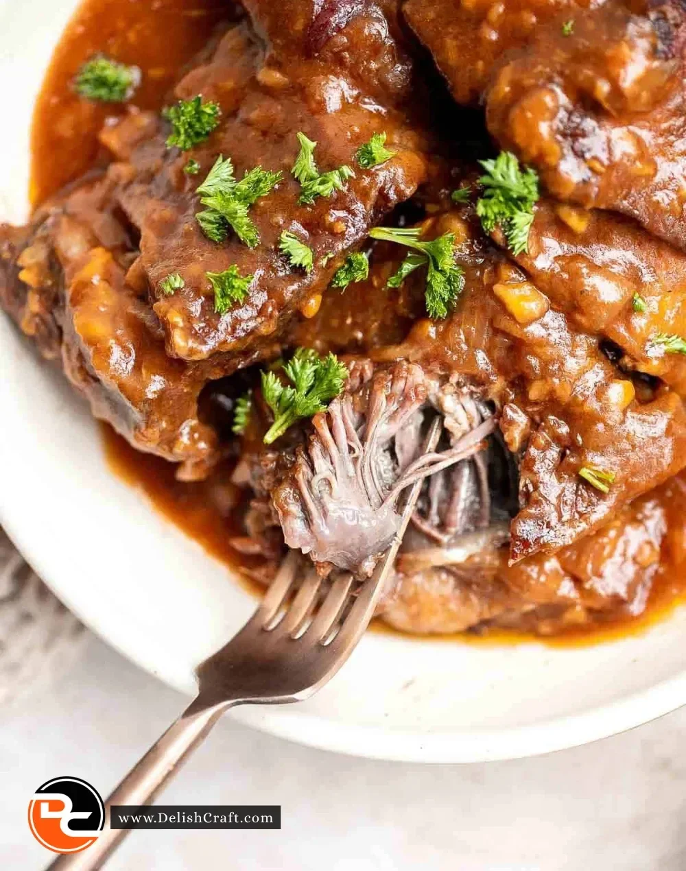 Deliciously cooked Instant Pot short ribs served with a rich sauce.