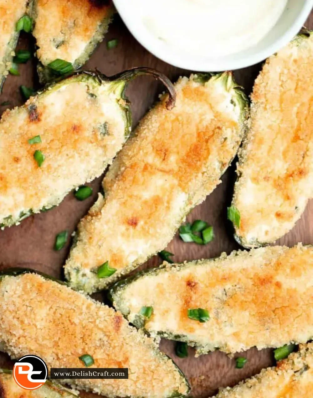 Plate of homemade jalapeño poppers with cheese and spices