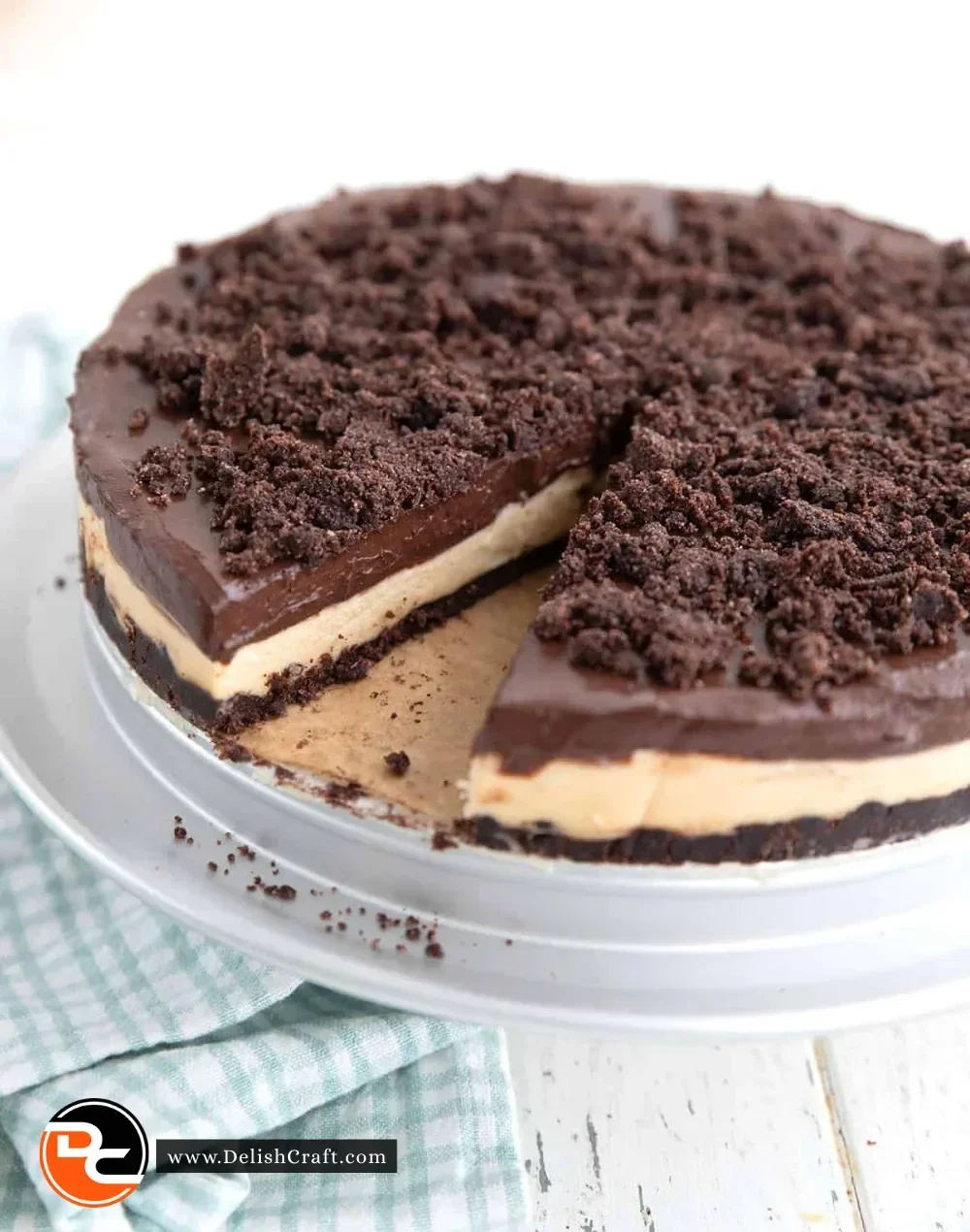 Keto Peanut Butter Dirt Cake with chocolate layers and peanut butter topping