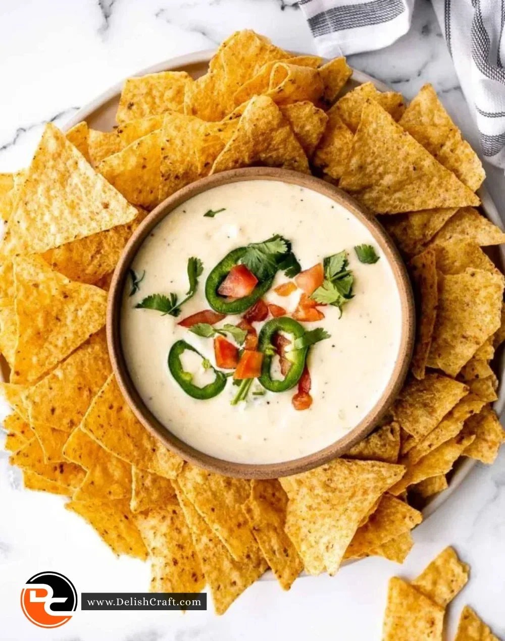 Delicious Mexican cheese dip served in a vibrant bowl, perfect for dipping.