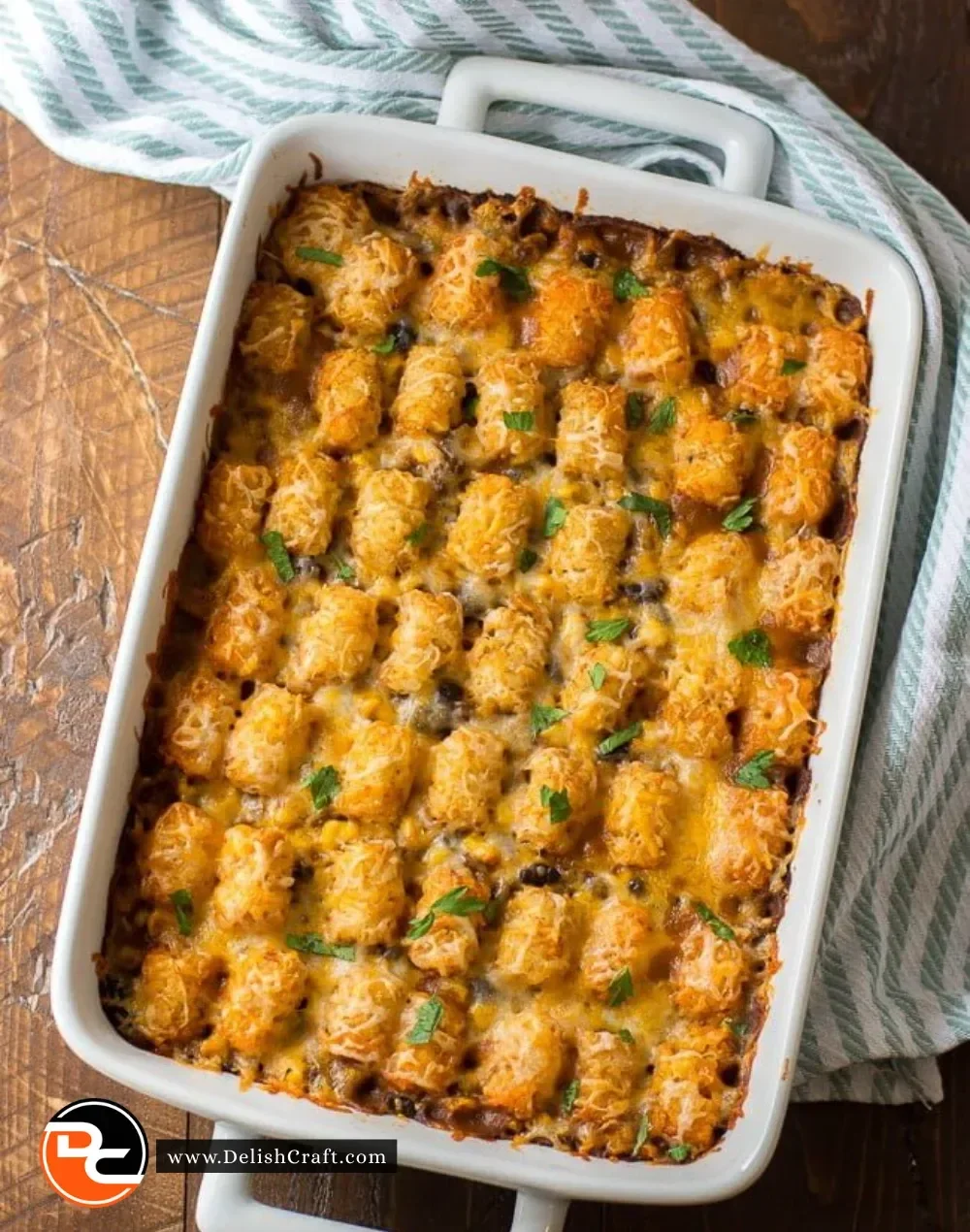 Delicious Mexican Tater Tot Casserole topped with cheese and spices