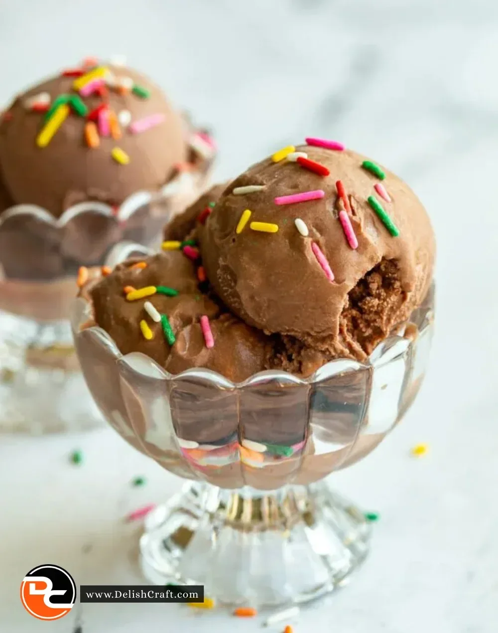 Homemade Ninja Creami chocolate ice cream in a bowl topped with chocolate shavings