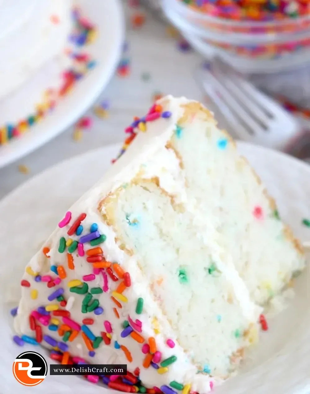 Ninja Foodi Confetti Cake with vibrant sprinkles on a white plate