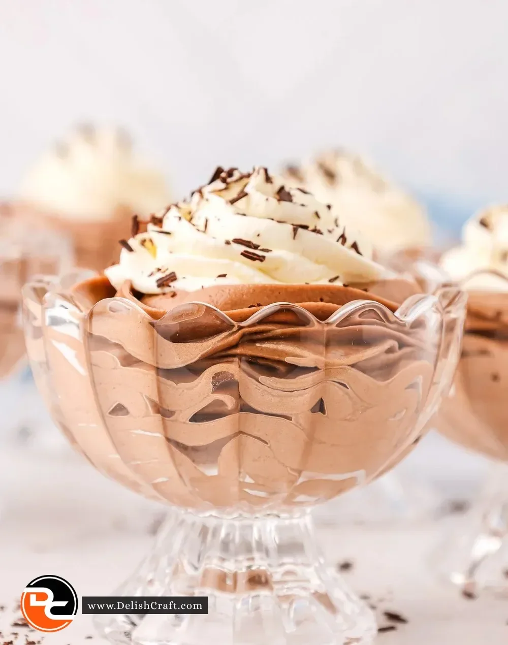 Delicious Nutella chocolate cheesecake mousse served in a glass dish topped with cocoa
