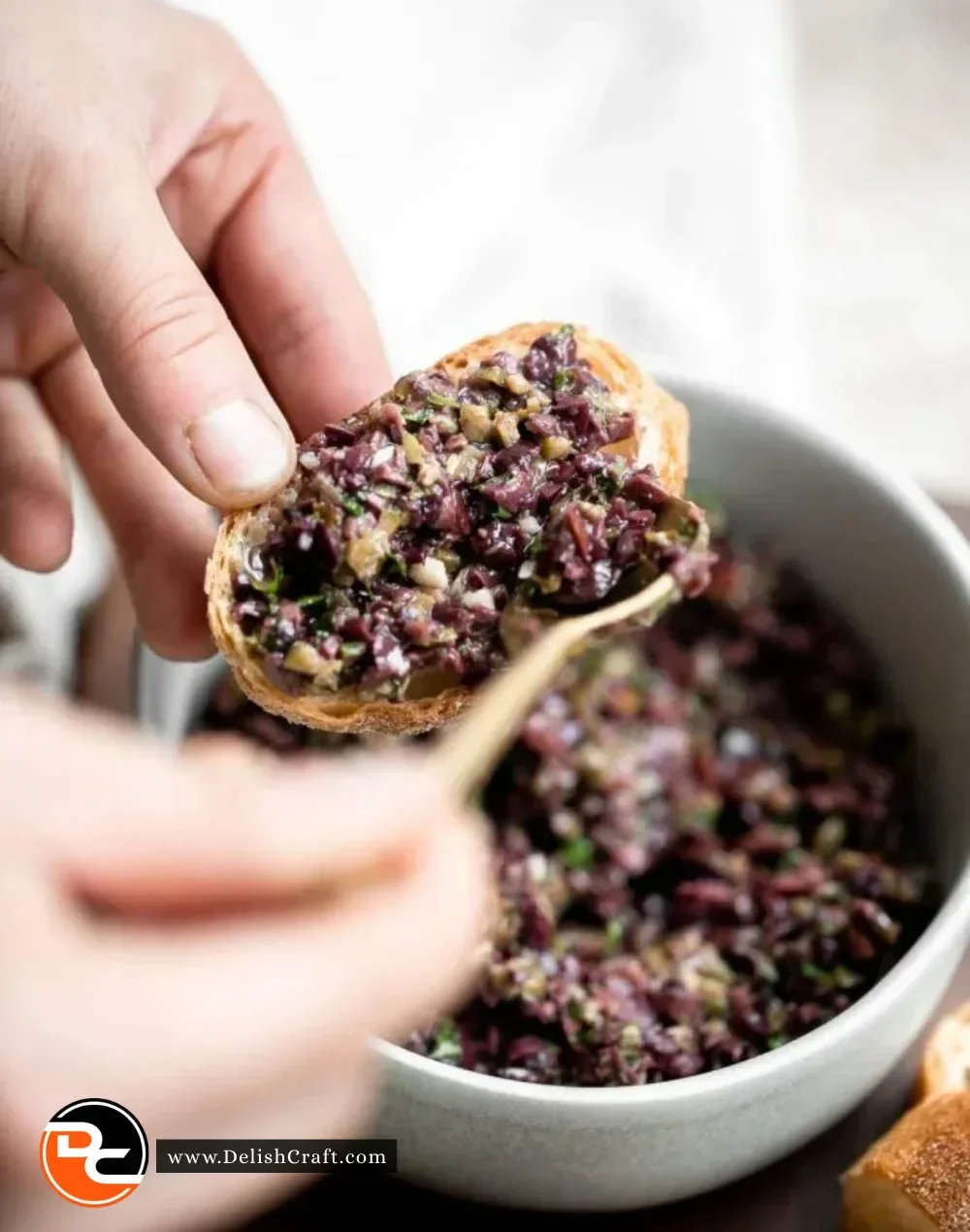 Homemade olive tapenade served as a delicious Mediterranean appetizer.