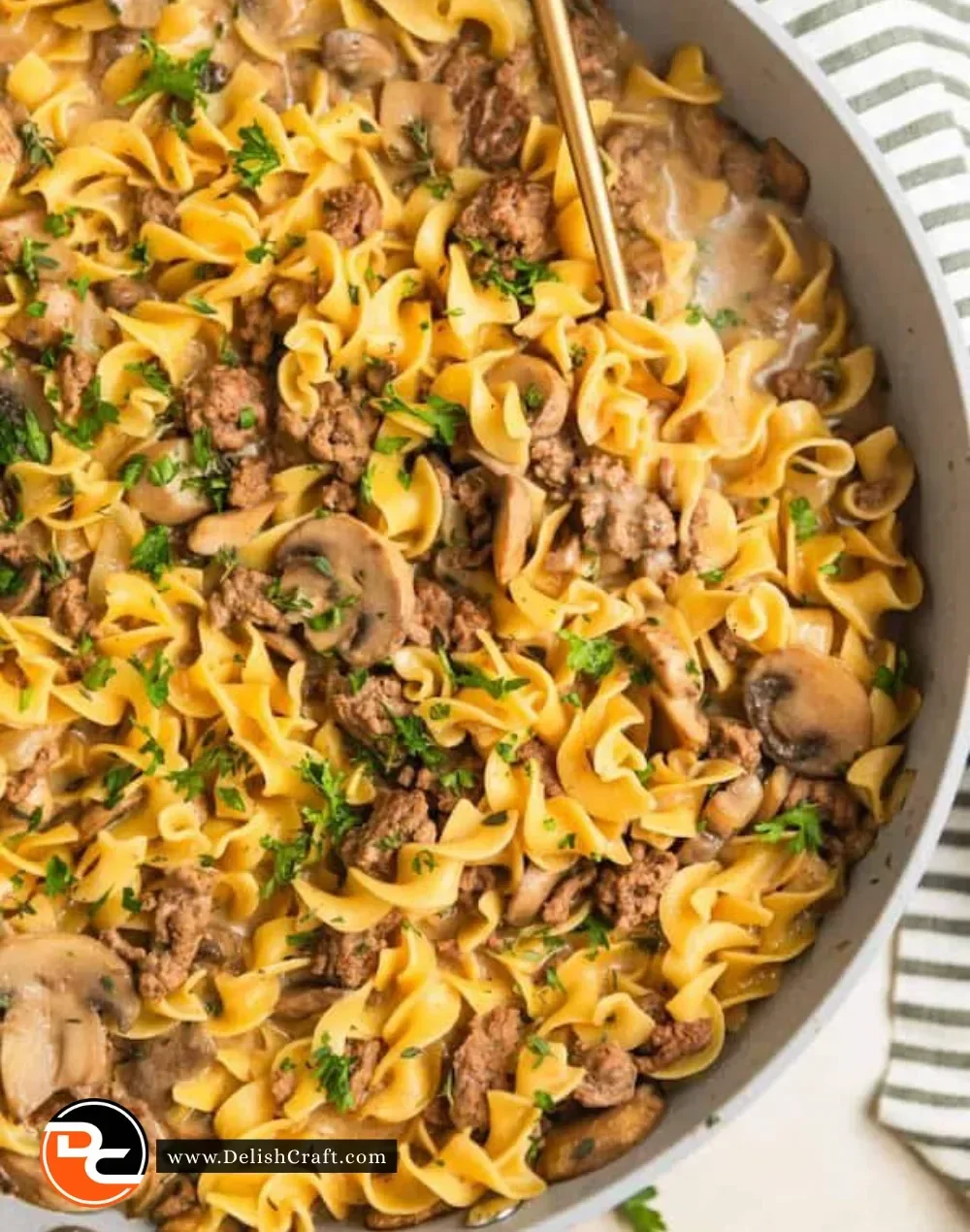 Delicious one-pot beef stroganoff served in a bowl with fresh parsley garnish.