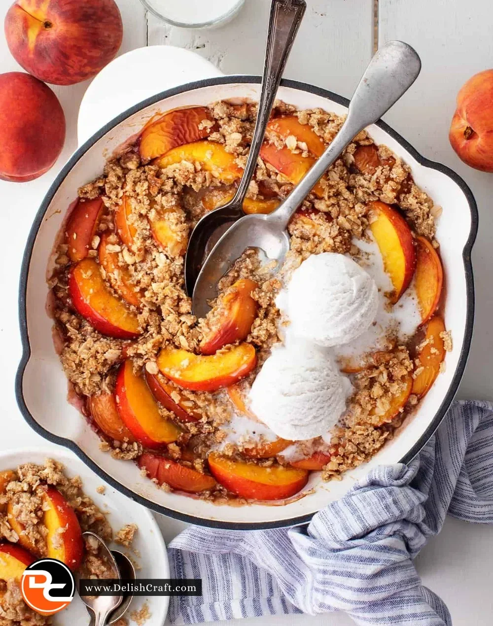 Delicious homemade peach crisp dessert with golden topping and fresh peaches