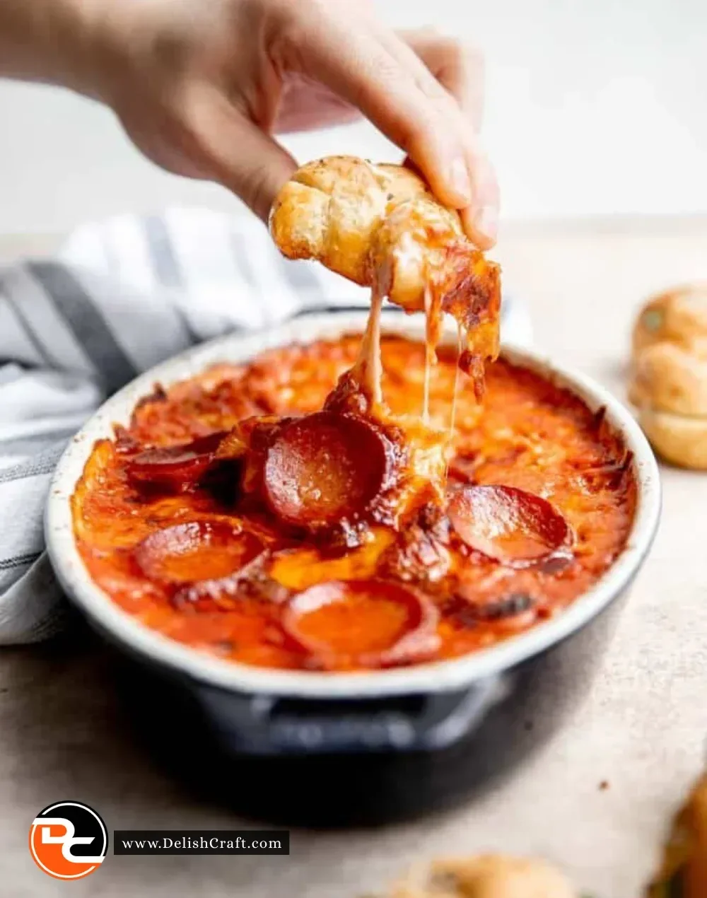 Delicious creamy Pizza Dip served with crispy breadsticks
