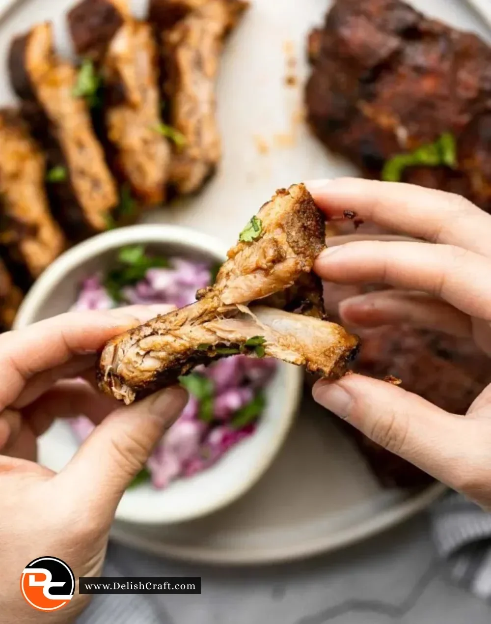 Delicious slow cooker BBQ ribs garnished and ready to serve.