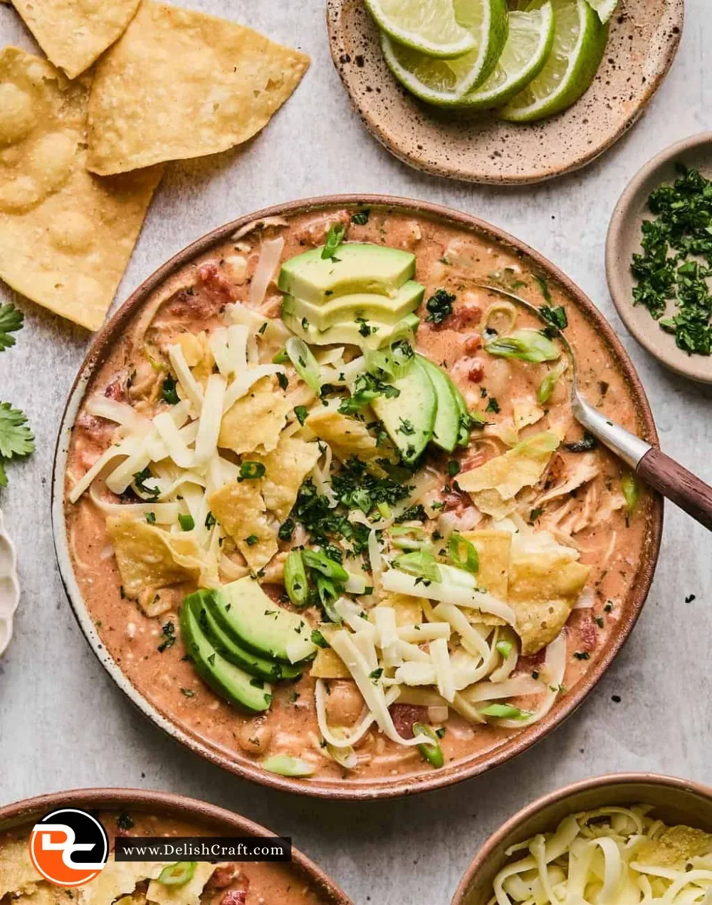 Delicious slow cooker buffalo chicken chili in a bowl topped with green onions