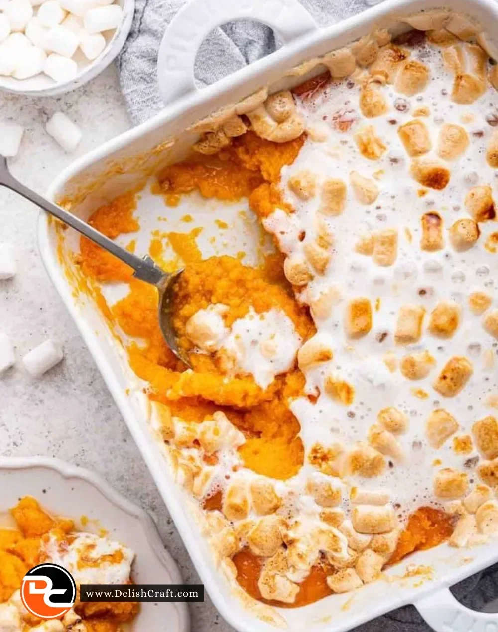 Delicious sweet potato casserole topped with toasted marshmallows