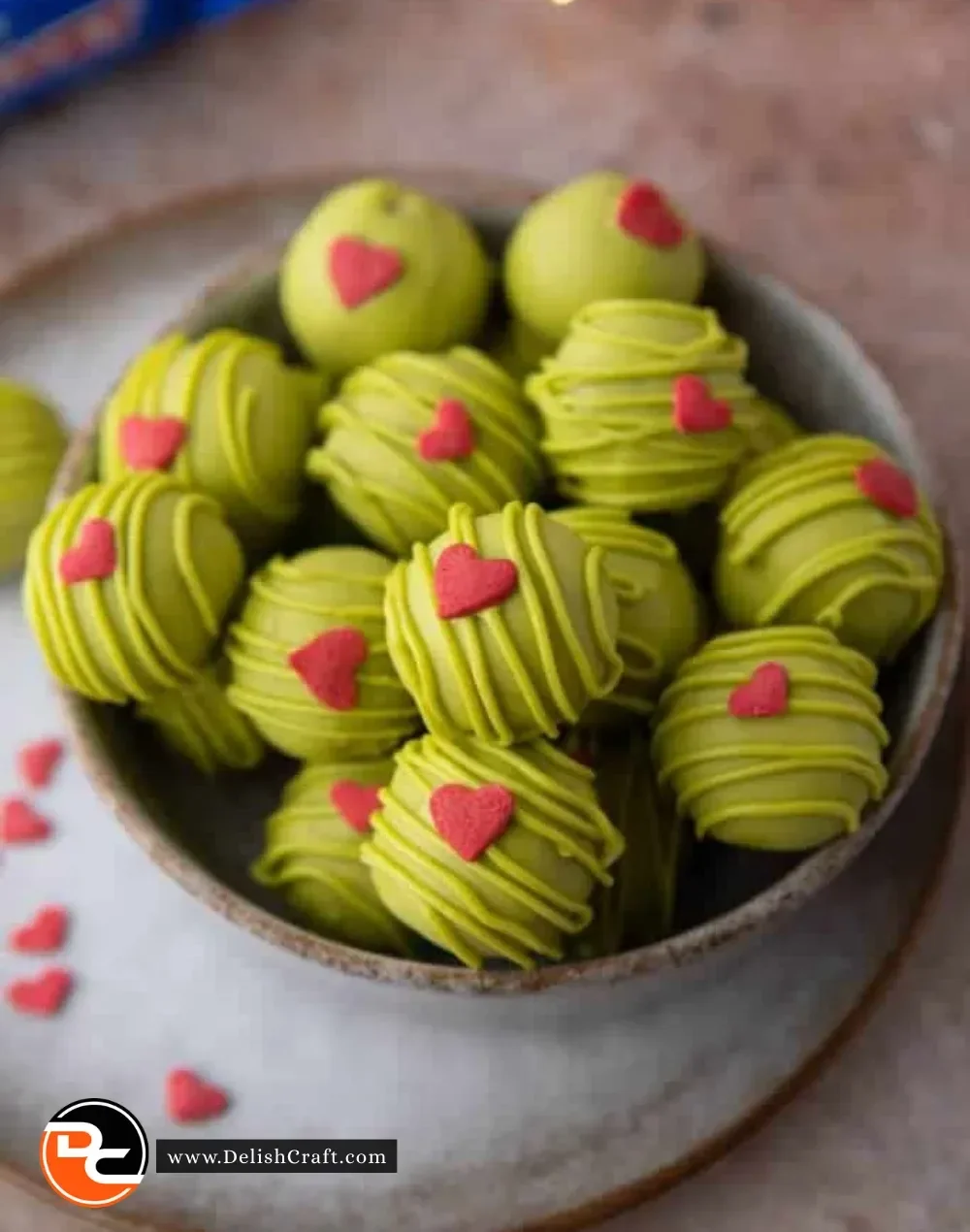 Delicious Grinch Oreo Truffles presented on a festive plate